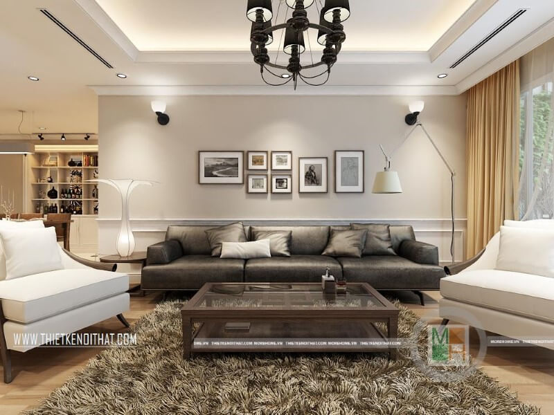 Mẫu thiết kế nội thất phòng khách sang trọng cho chung cư với bộ sofa da cao cấp màu đèn, trắng tạo điểm nhấn nổi bật cho căn phòng. Xem ngay các mẫu kế phòng khách đẹp đẳng cấp