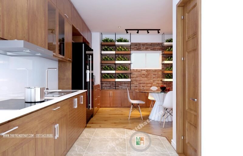 Thiết kế phòng bếp chung cư hiện đại với hệ tủ bếp gỗ tự nhiên cao cấp mang đến không gian nấu ăn lí tưởng cho các chi em nội trợ. Thiết kế tủ bếp chung cư