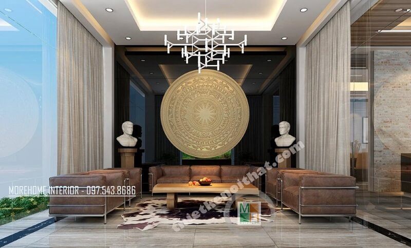 Trang trí nôi thất phòng tiếp khách văn phòng đẹp sửu dụng đá tự nhiên ốp tường, bộ sofa da cao cấp, đèn trang trí,.. với tông màu nâu trầm chủ đạo