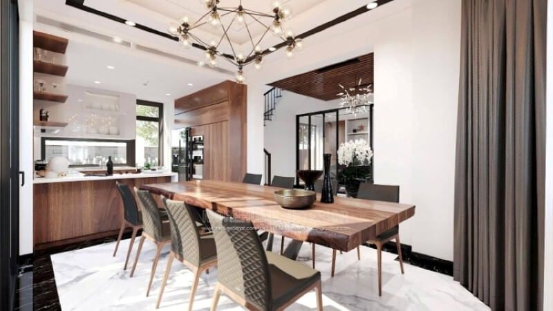 Ngoài điểm đặc biệt từ cách bố trí kệ trang trí, bàn đảo bằng đá nhân tạo màu trắng được thiết kế nhô ra ngoài lại là điểm đáng chú ý, một mặt vẫn đảm bảo diện tích để chủ nhân có thể trưng bày món ăn thỏa mái, một mặt bạn lại có thể vừa nội trợ vừa có thể để mắt con học một cách dễ dàng.